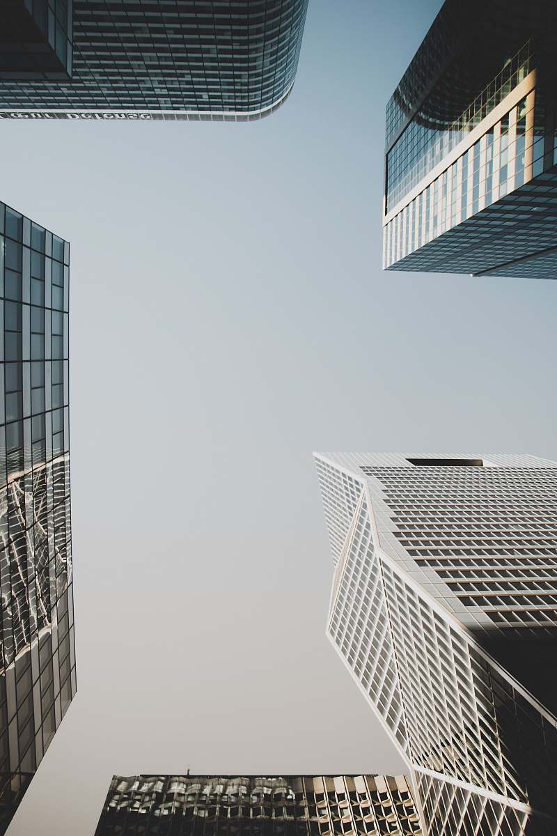 office building low angle photography of concrete buildings grey